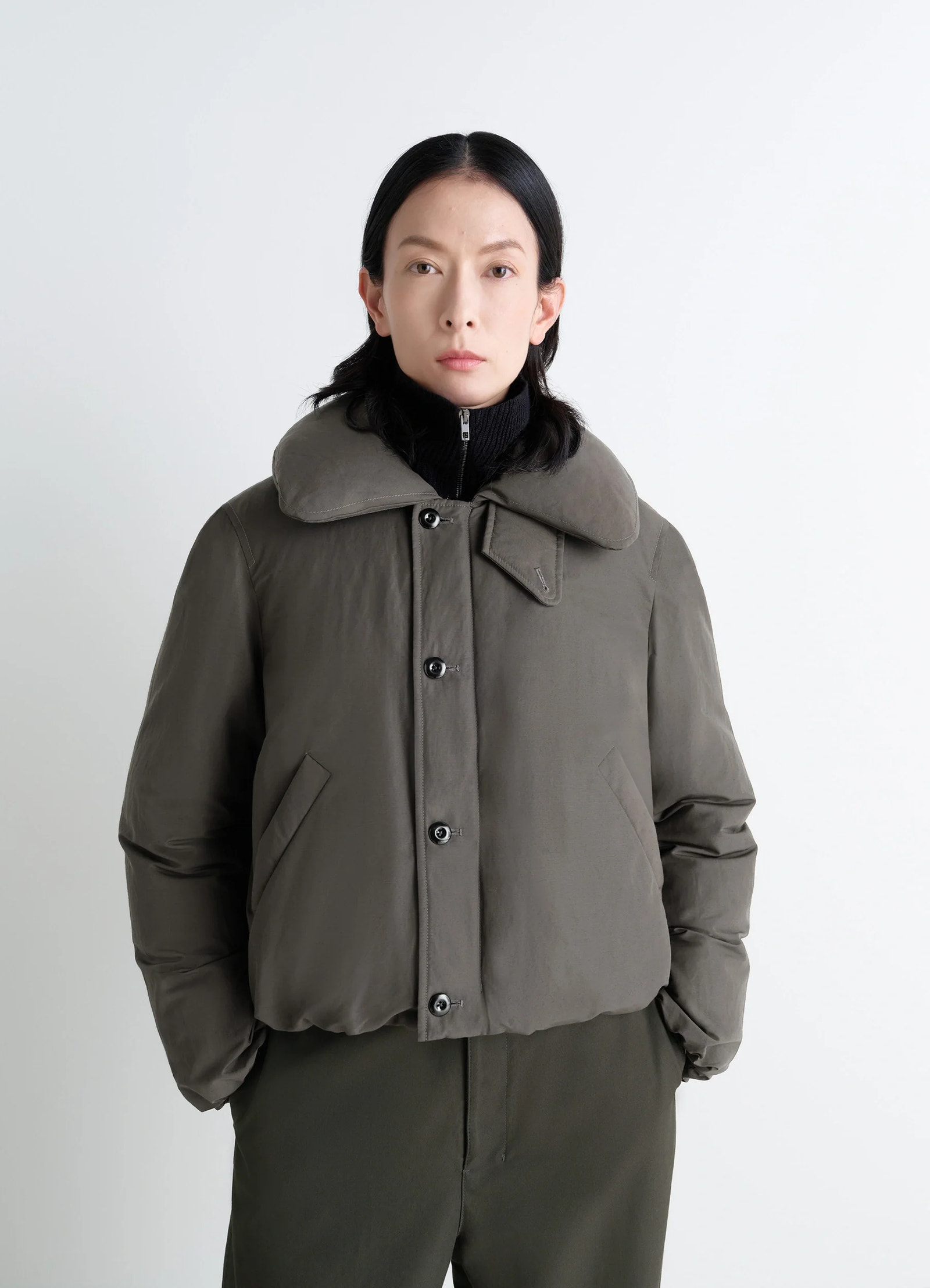 Lemaire short puffer blouson in linen cotton blend, model shot, close-up front view structured shoulders