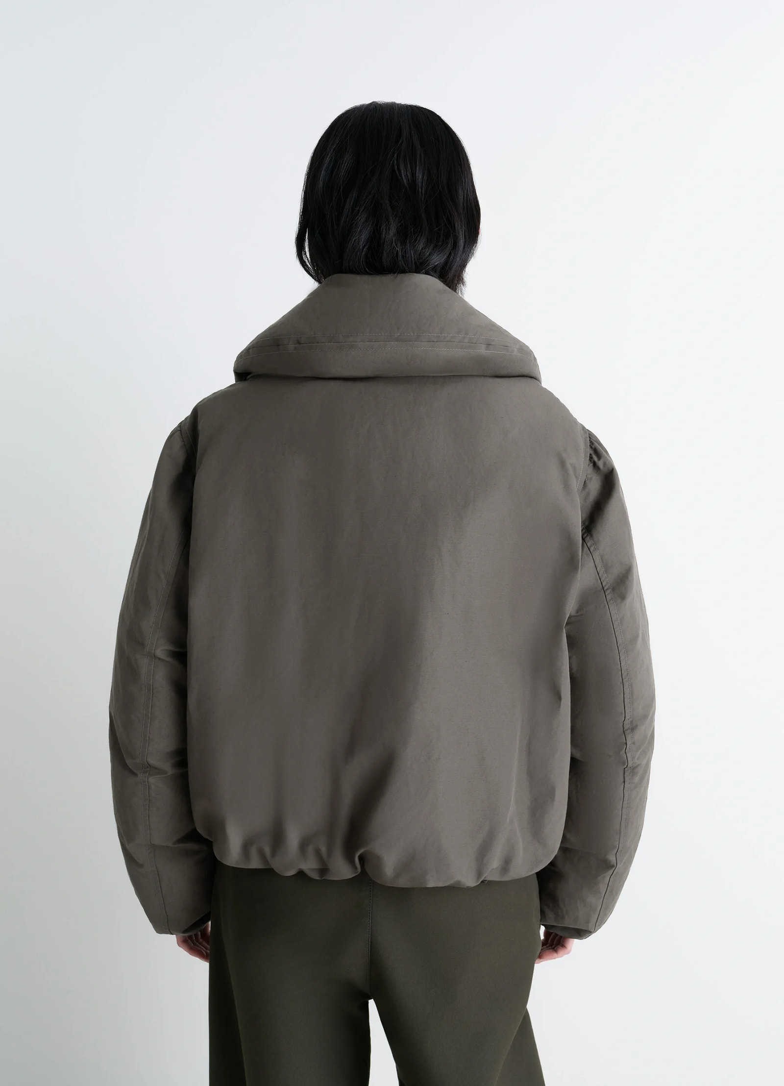 Lemaire short puffer blouson in linen cotton blend, model shot, back view elastic hem