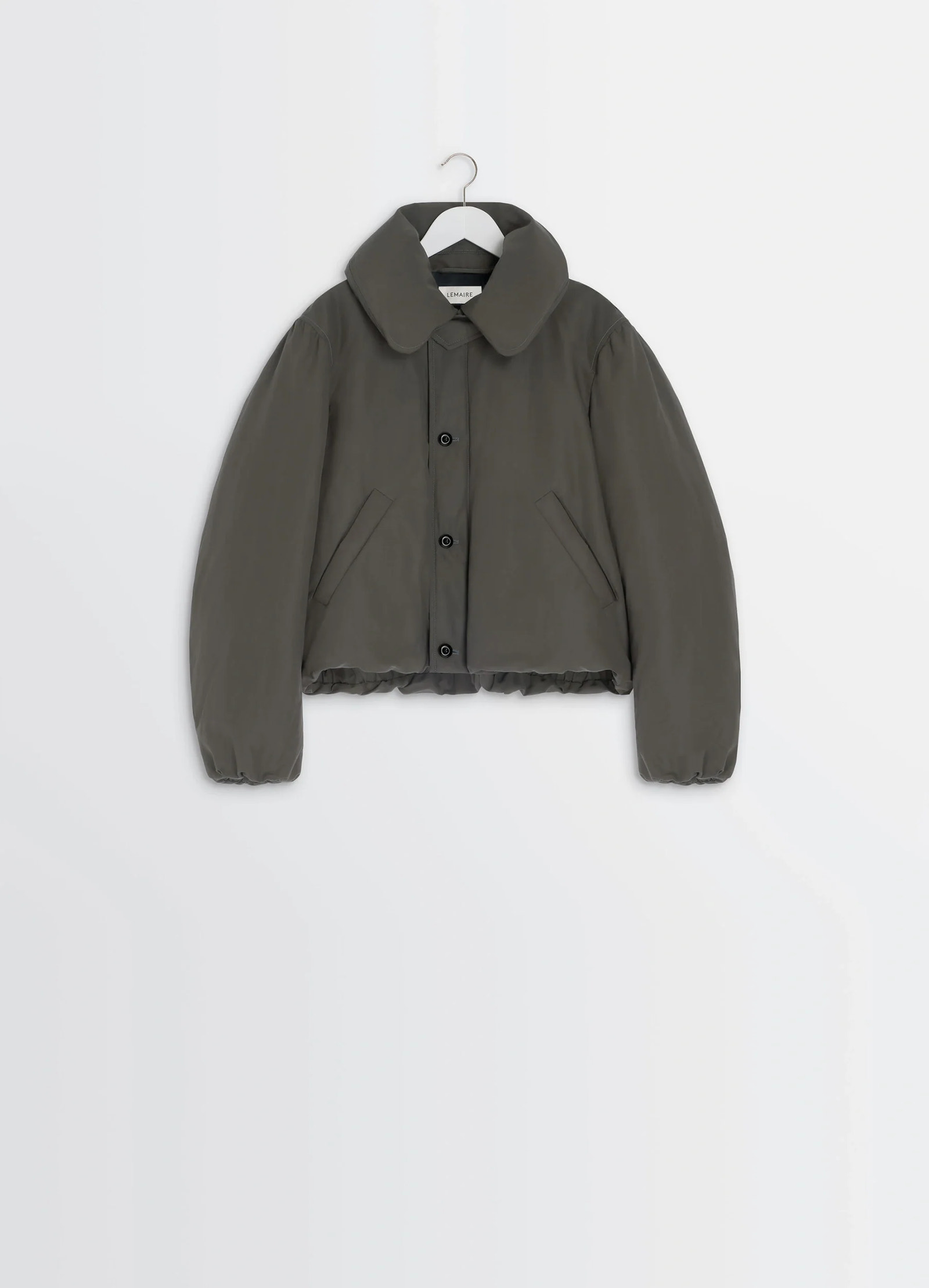 Lemaire short puffer blouson in linen cotton blend, product shot, hanging front view balloon sleeves visible
