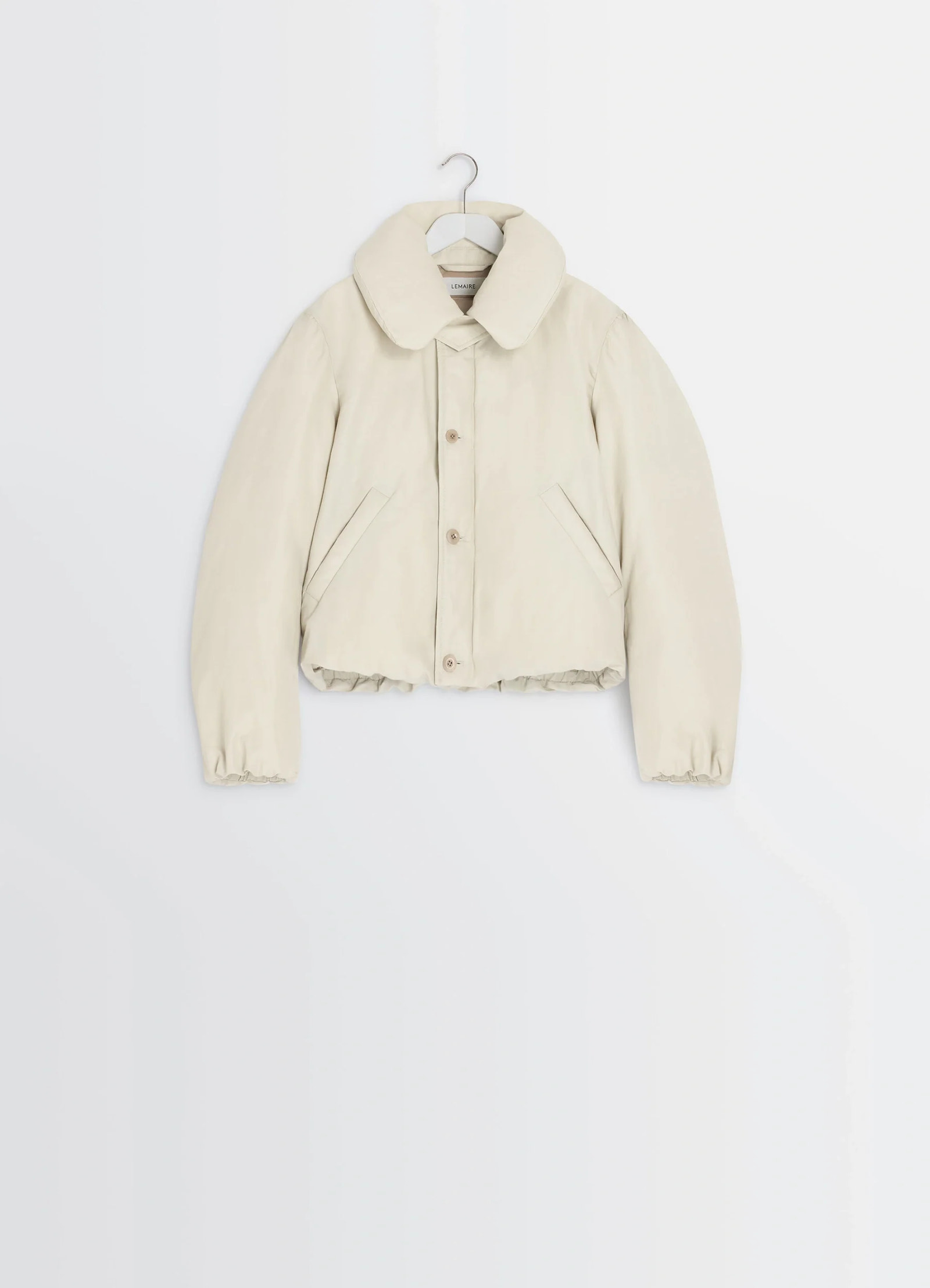 Short puffer blouson in linen cotton blend, product shot, hanger view pockets, button front