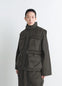 Lemaire Wadded Gilet in Deep Brown Nylon, model shot, Front side view Gusseted pockets