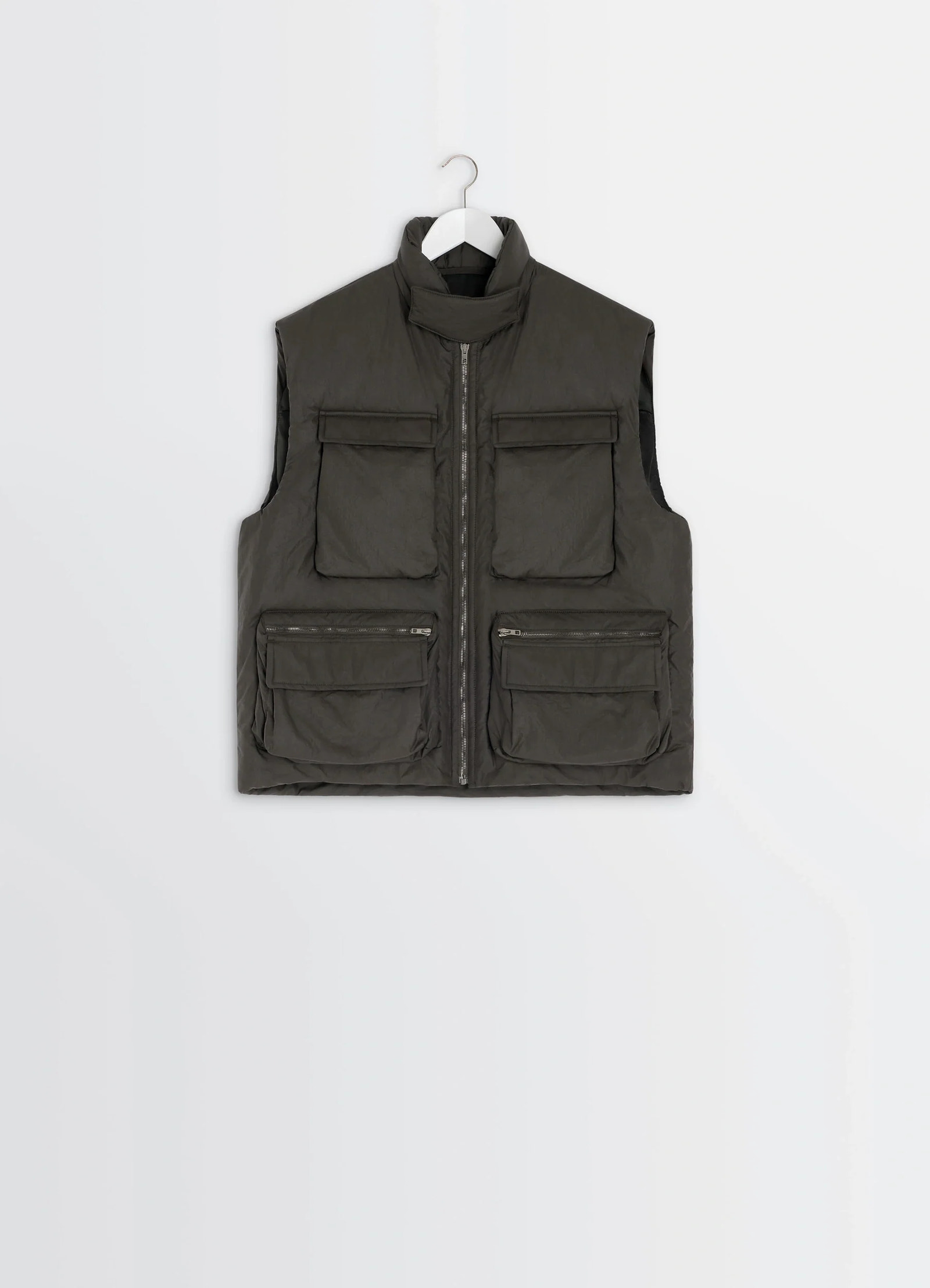 Lemaire wadded gilet in deep brown nylon, product shot, straight hanging view four front pockets shown