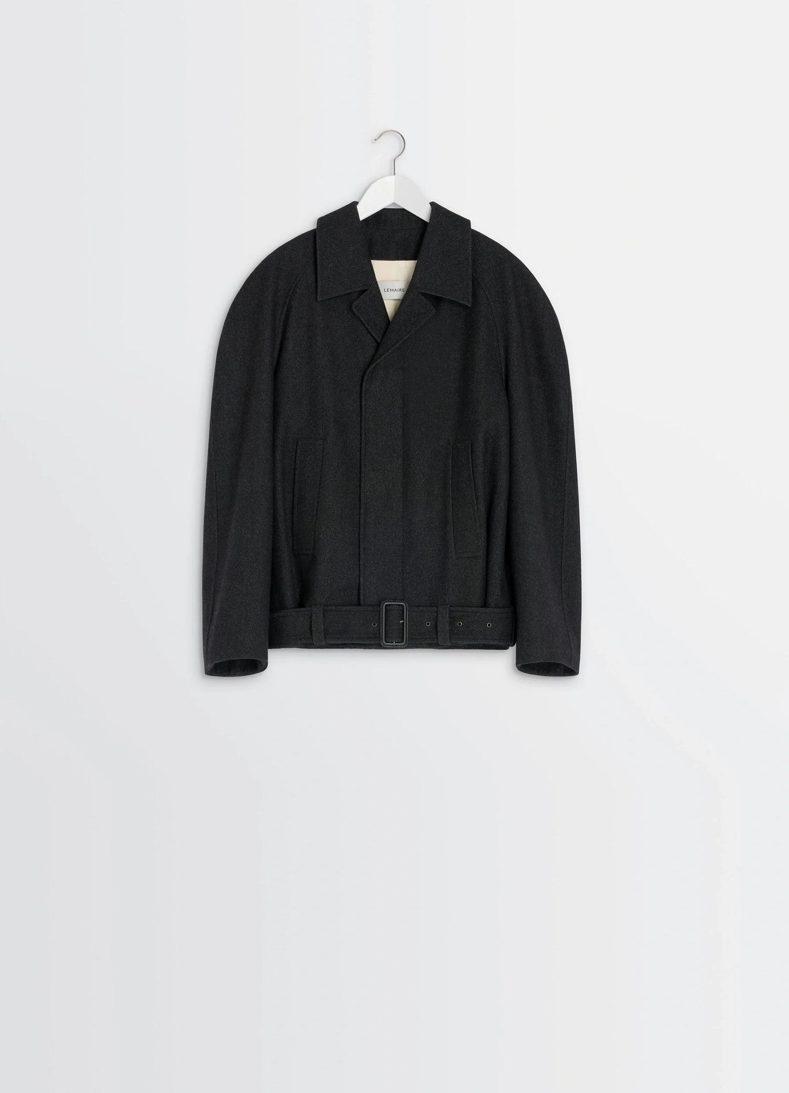 Lemaire raglan sleeve short coat in rws wool and cotton twill, product shot, hanging display view belted hem detail