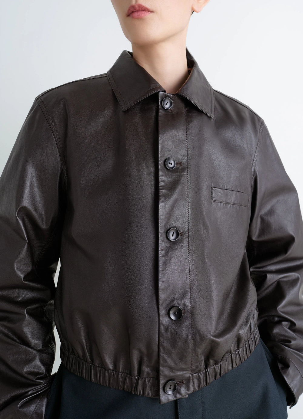 Lemaire Soft Leather Blouson in Soft cow leather, model shot, detail shot spread collar, chest pocket