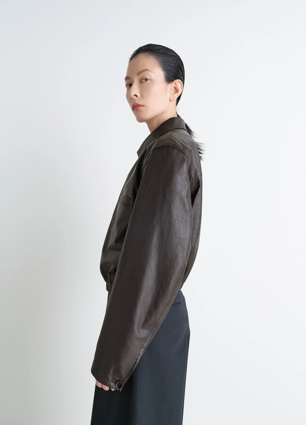 Lemaire Soft Leather Blouson in Soft cow leather, model shot, side view long sleeves