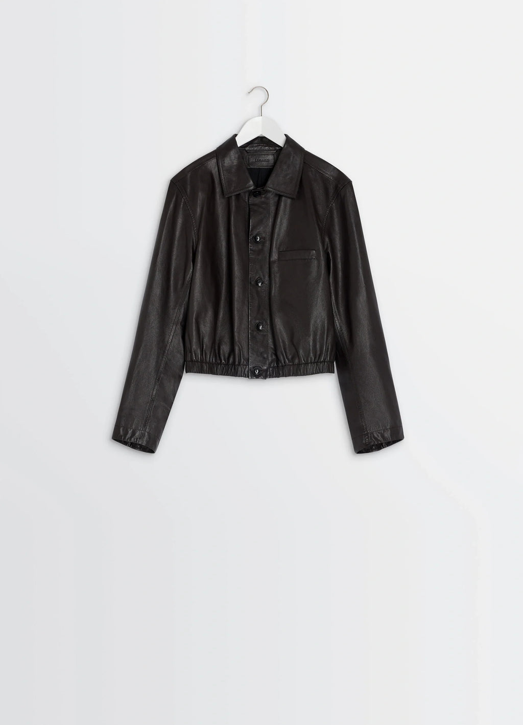 Lemaire Soft Leather Blouson in Soft cow leather, product shot, hanging front view elastic cuffs, buttoned