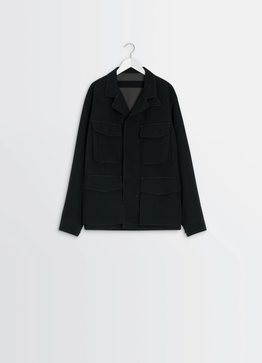 Soft Field Jacket in Black Wool Twill, product shot, hanging display shot layered front pockets