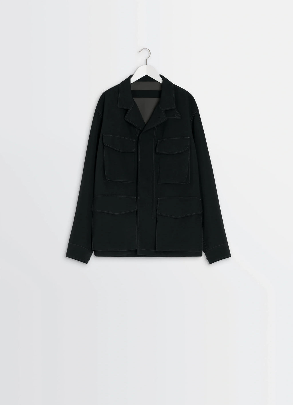 Soft Field Jacket in Black Wool Twill, product shot, hanging display shot layered front pockets