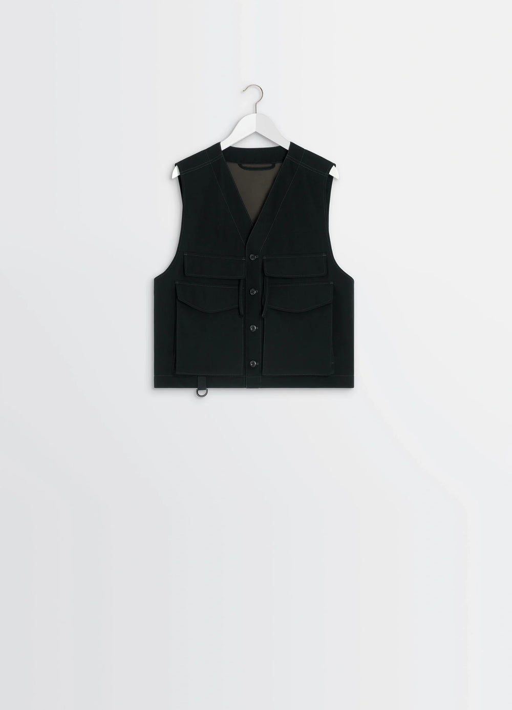 UTILITY GILET in light wool twill, product shot, hanging view shoulder seam focus