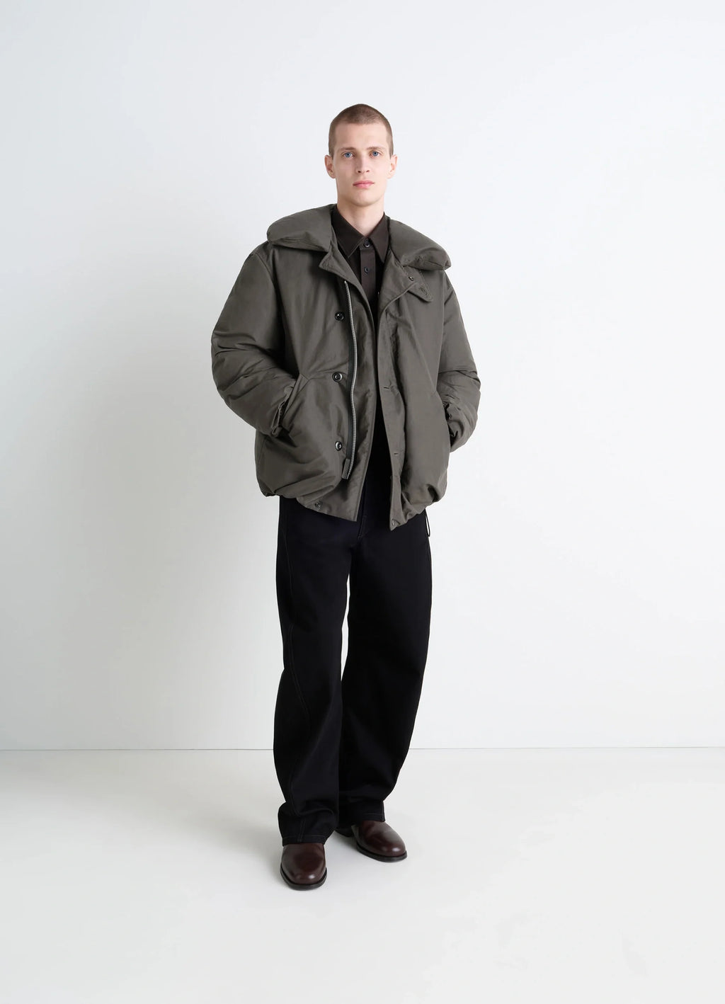 Puffer Blouson in Olive Linen Cotton, model shot, three-quarter view feather-filled design