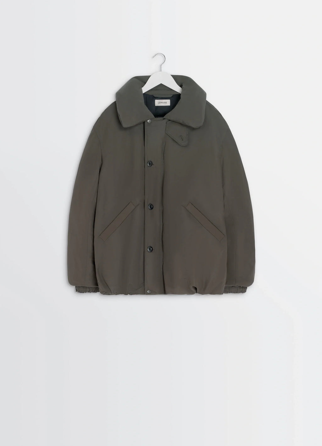 Puffer Blouson in Olive Linen Cotton, product shot, hanging display buttoned front pockets