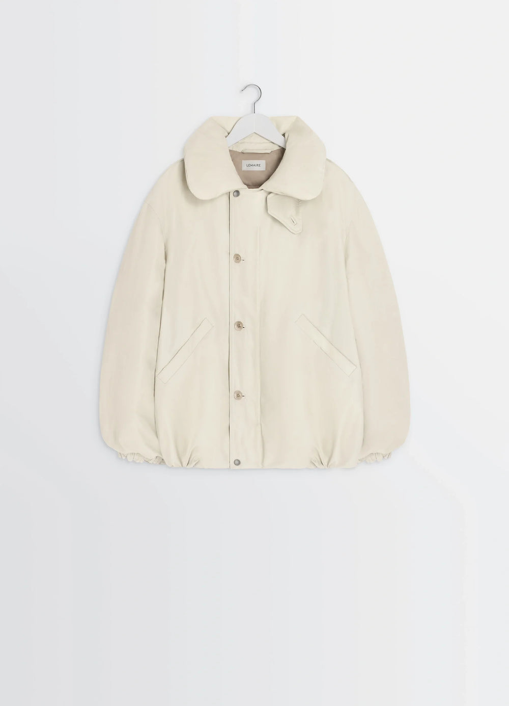 Puffer Blouson in Light Beige Linen Cotton, product shot, hanger front view elastic hem detail