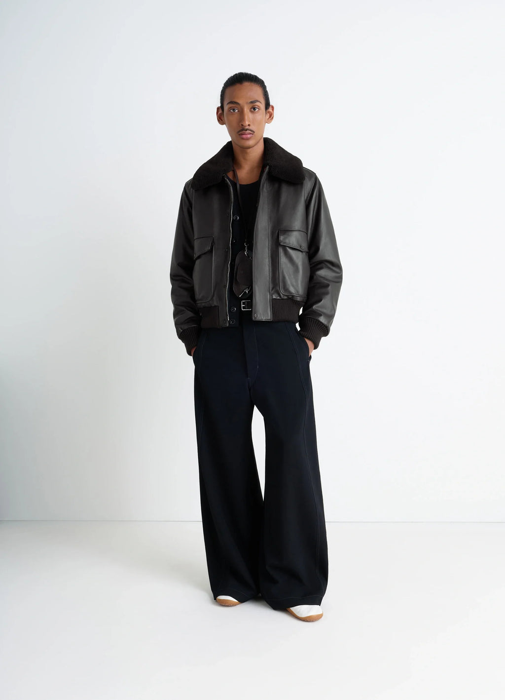 Lemaire Leather Blouson in Brown Cow Leather, model shot, full body view ribbed cuffs