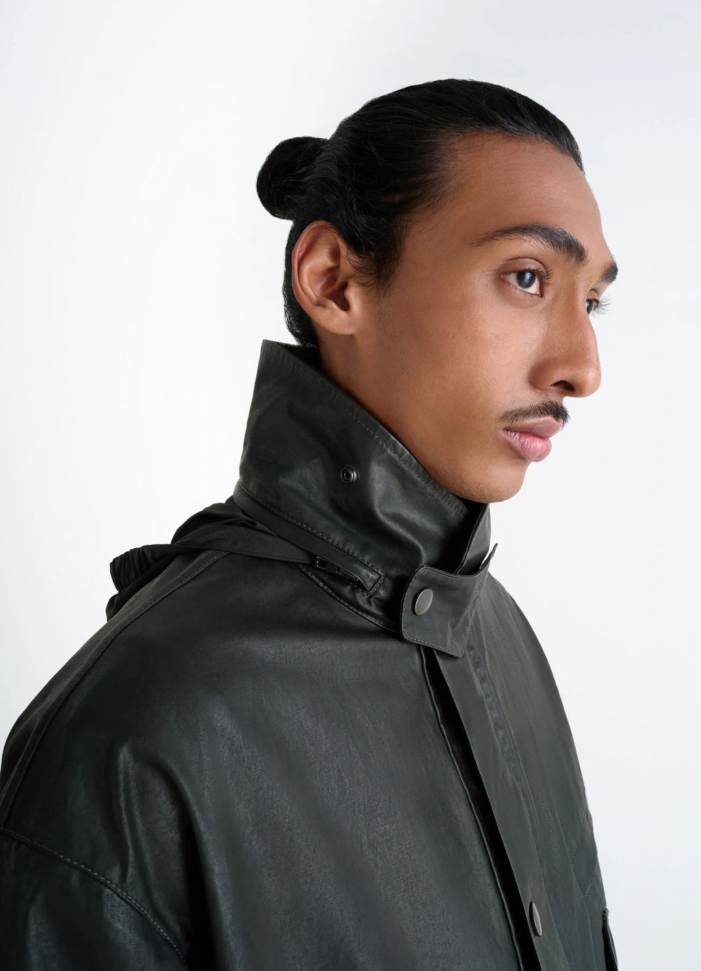 Short Rain Jacket in Resinated Cotton, model shot, side profile view high collar close-up