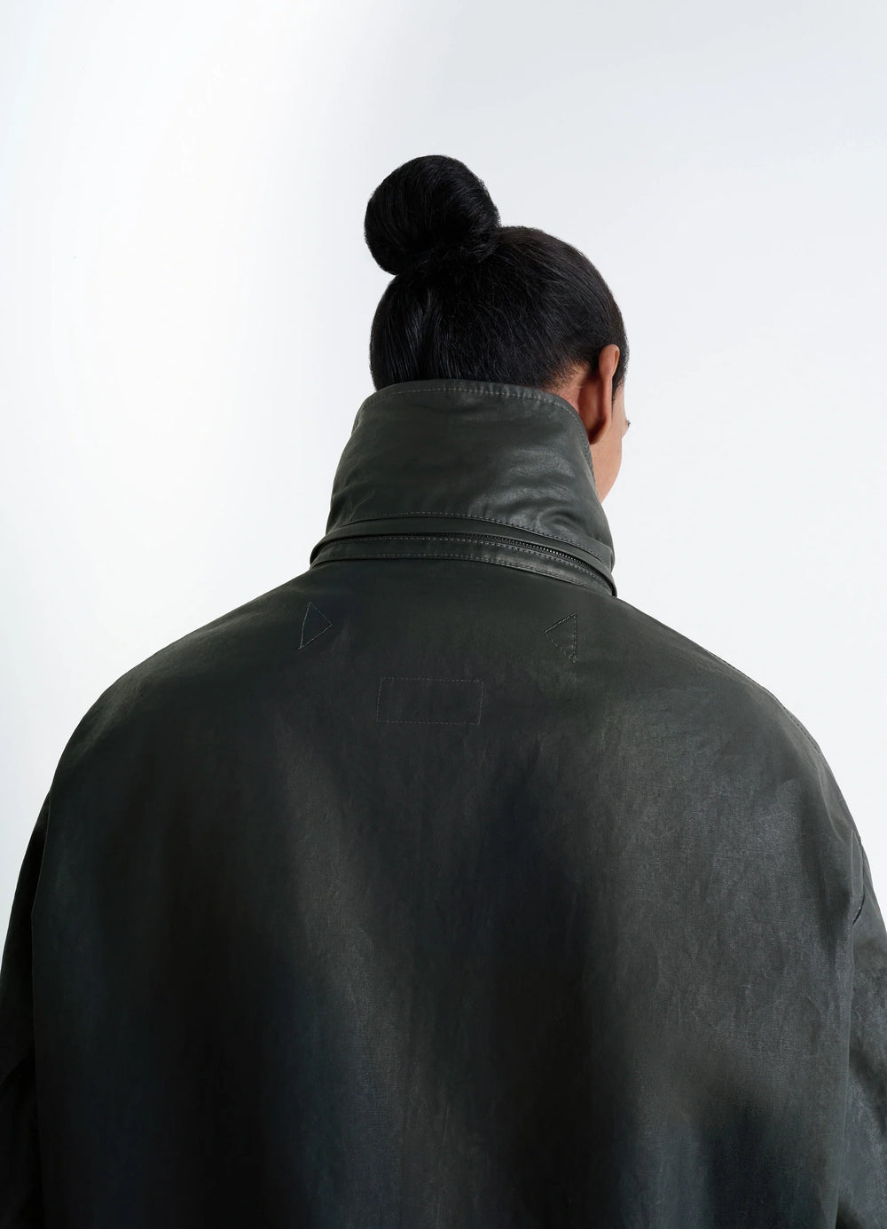 Short Rain Jacket in Resinated Cotton, model shot, back view high collar worn up