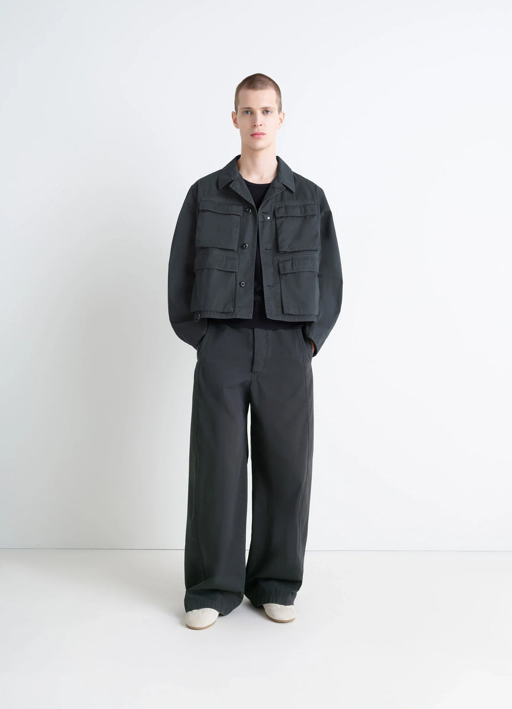 Short Utility Jacket in Dark Cotton Twill, model shot, full body view cropped fit
