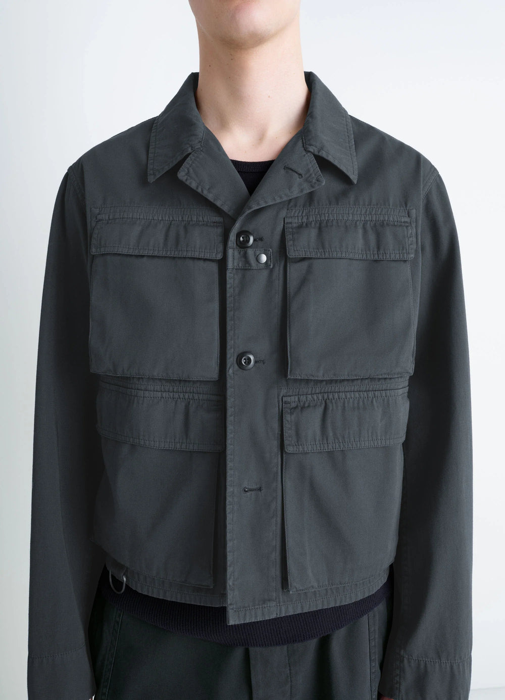 Short Utility Jacket in Dark Cotton Twill, model shot, close-up view buttoned placket