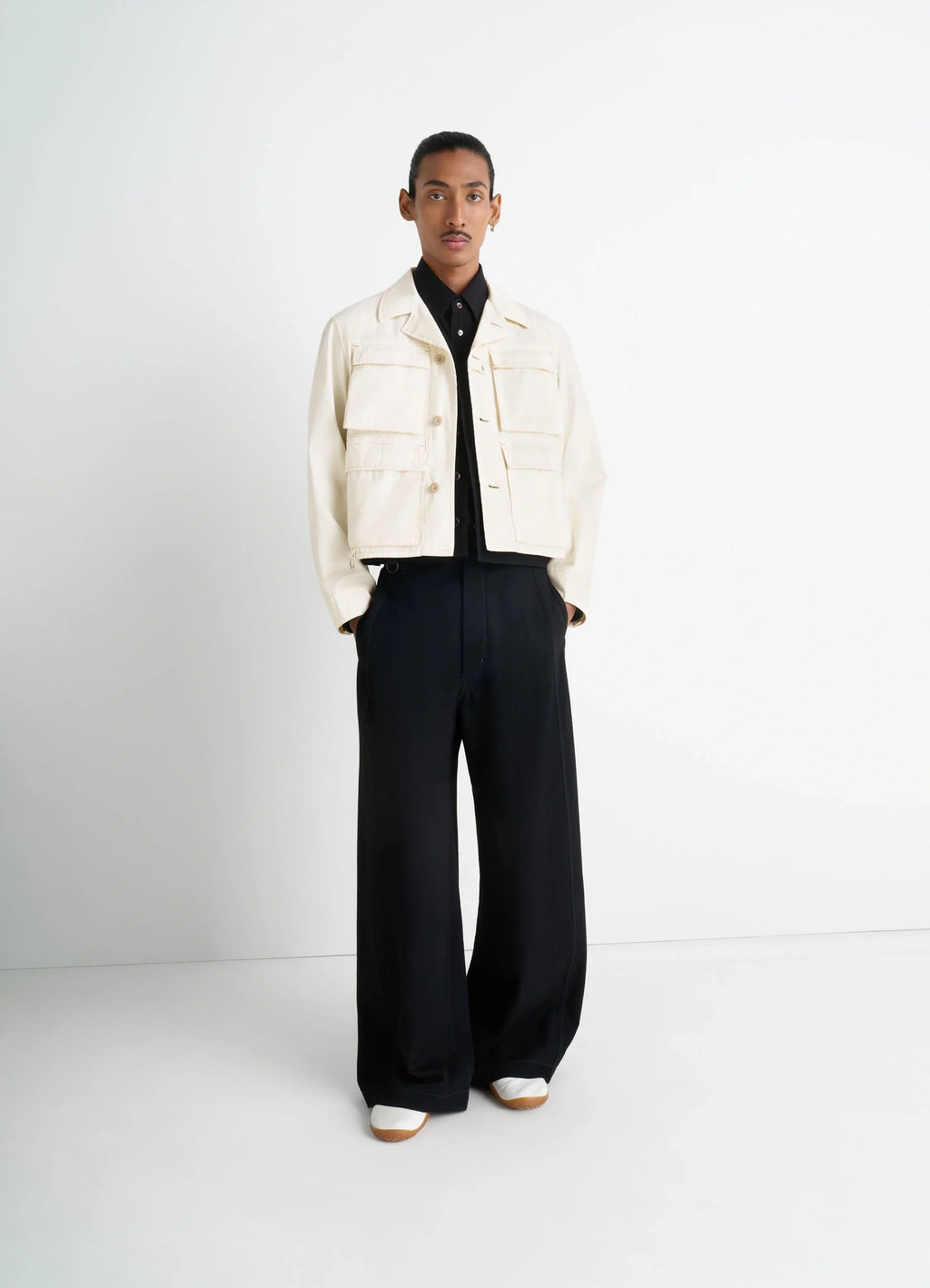 Short Utility Jacket in Compact Cotton Twill, model shot, 3/4 view metal buckles