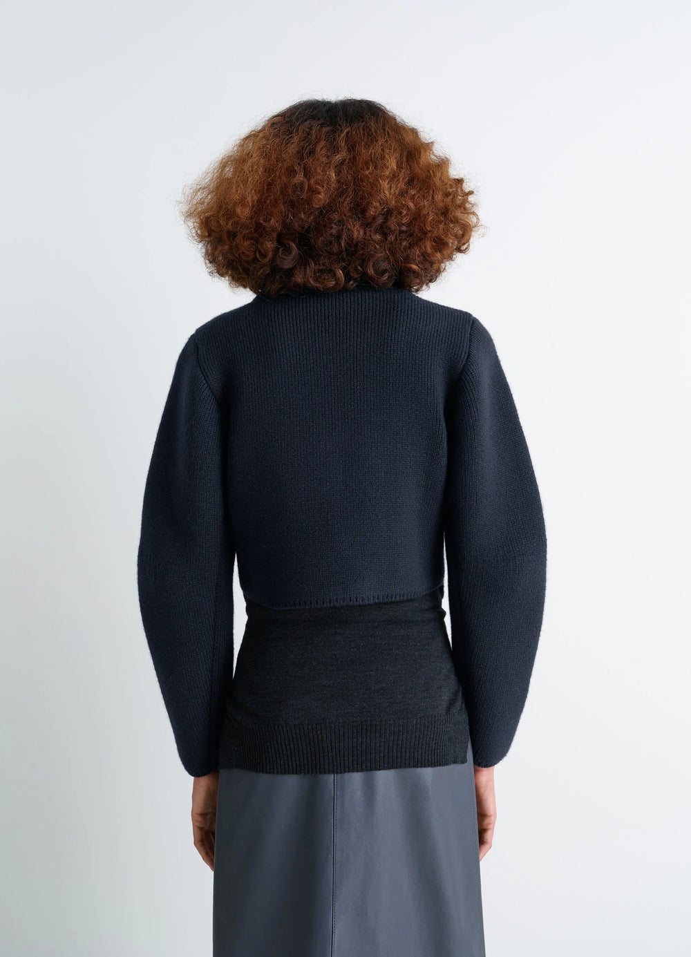 Felted Blouson in Navy Wool Blend, model shot, back view puffed sleeves