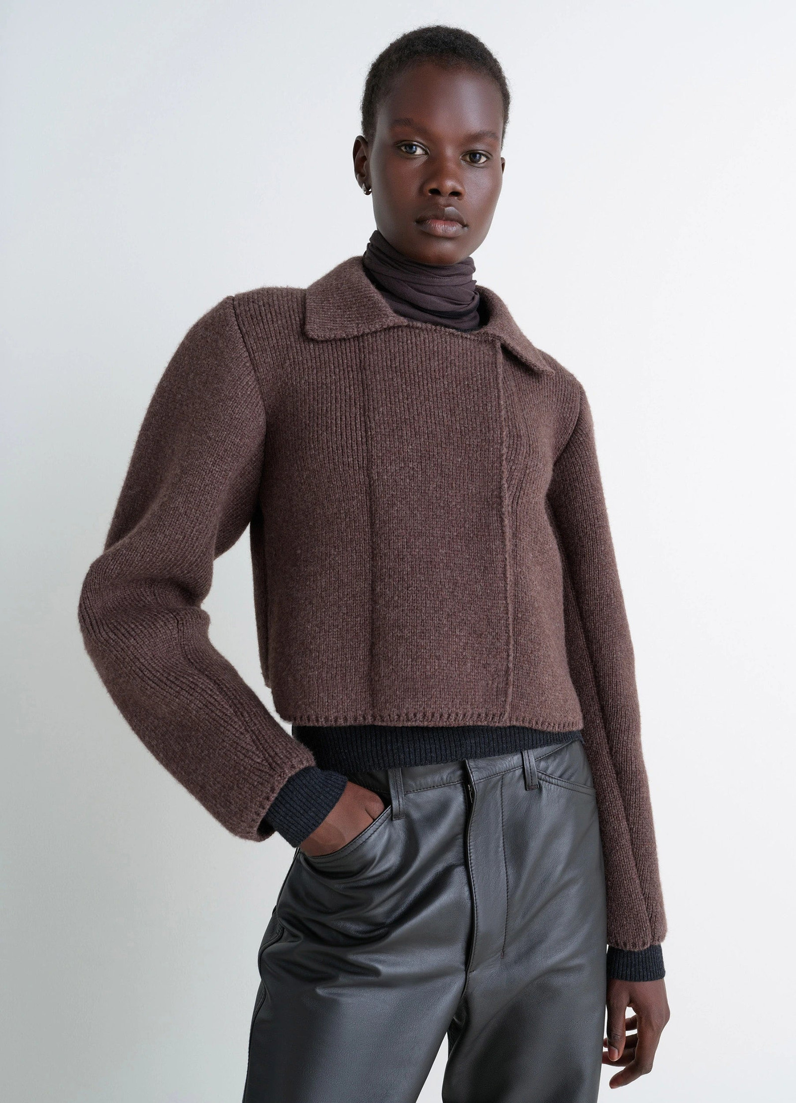 Felted blouson in wool blend brown, model shot, front view architectural silhouette
