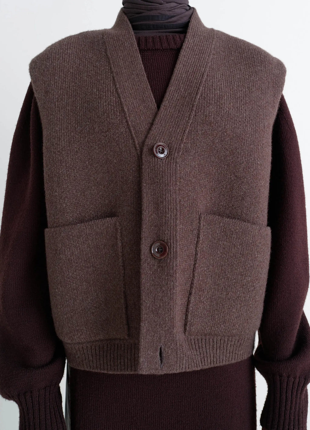 Maxi Sleeveless Cardigan in Wool Blend Double-Faced Knit, model shot, close-up view ribbed hem, button detail