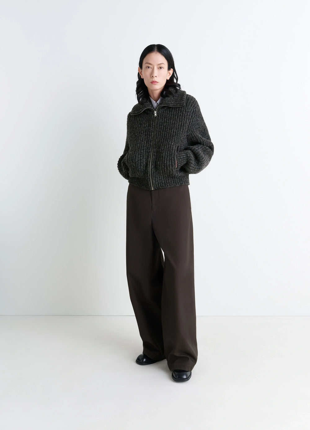 Crafted Densely Ribbed Knit in Alpaca and Yak Wool, model shot, side view zip-up with stand-up collar