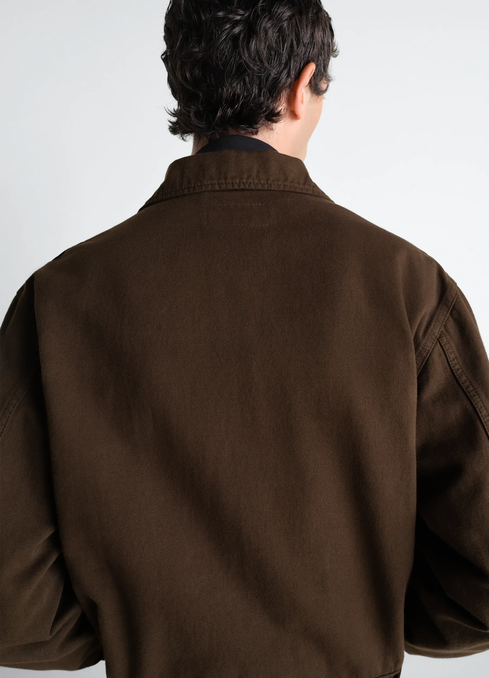 Trucker jacket in dyed broken twill in dyed broken twill, model shot, back view collared design
