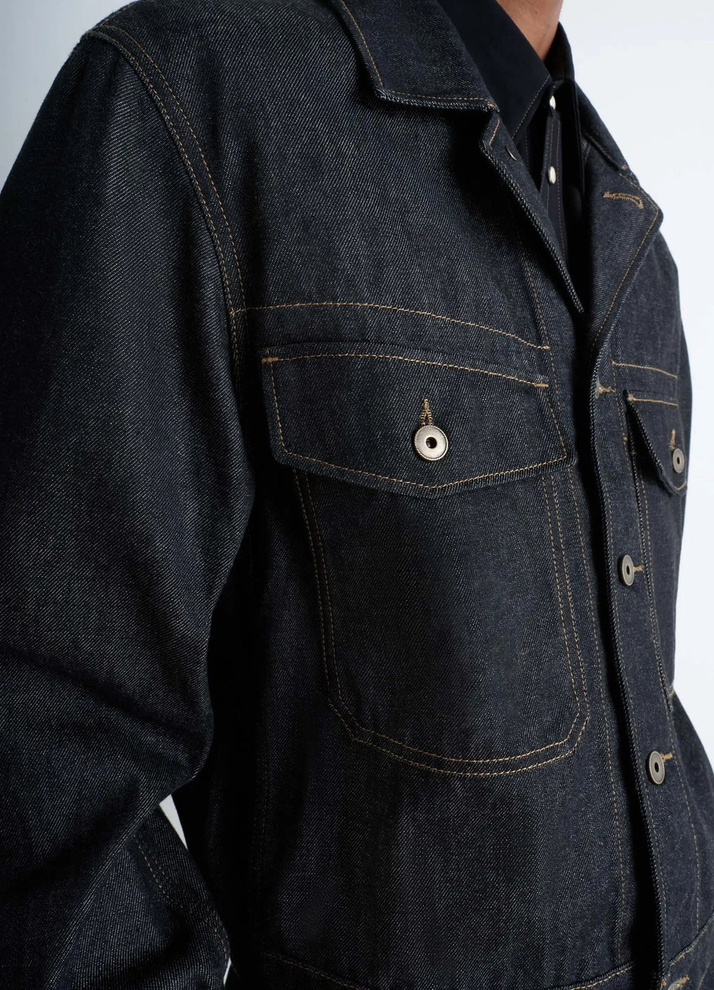 Lemaire Trucker Jacket in Slate Denim, model shot, close-up view chest pockets detail