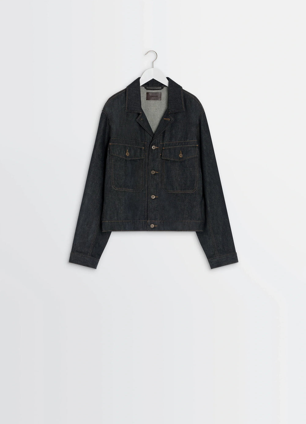 Lemaire Trucker Jacket in Slate Denim, product shot, hanger view top button fastened