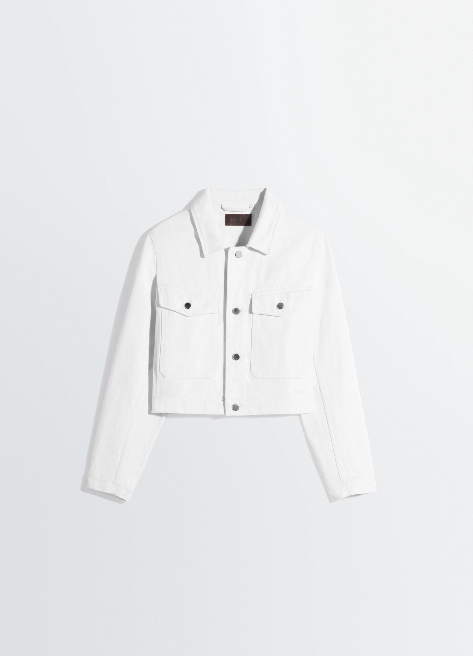 Cropped blouson in denim in bleached denim, product shot, top-down view button-down collar