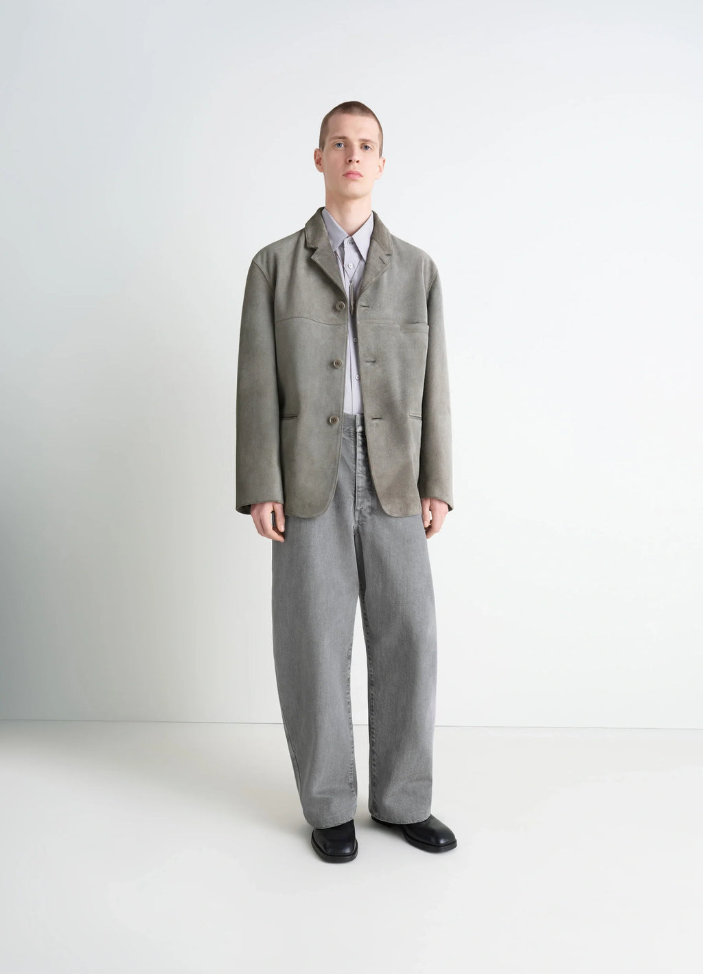 Suede Single Breasted Jacket in Brushed Suede Cow Leather, model shot, three-quarter view soft matte finish