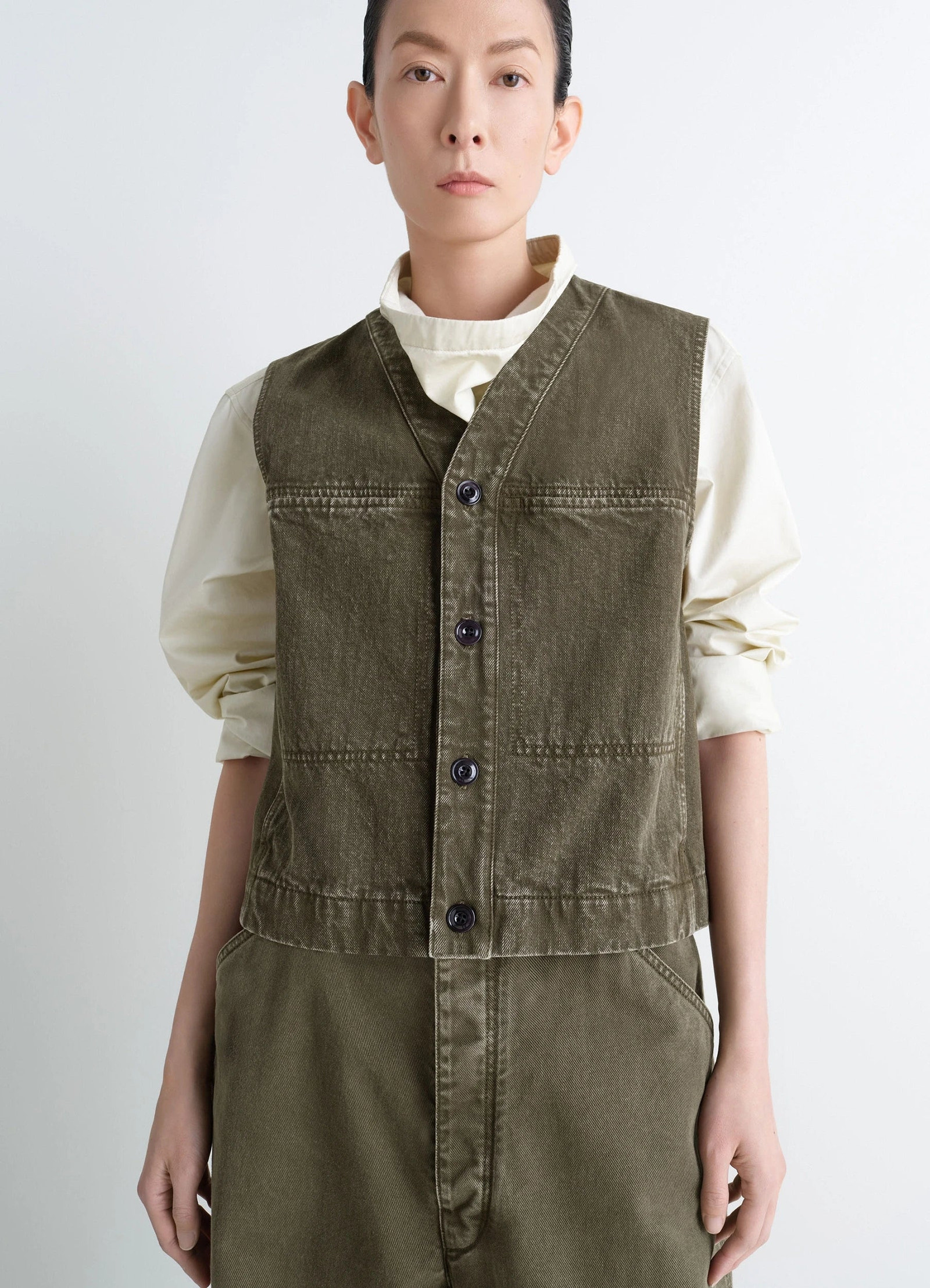 Lemaire pocket gilet in garment dyed snow thick denim, model shot, front view utilitarian fit