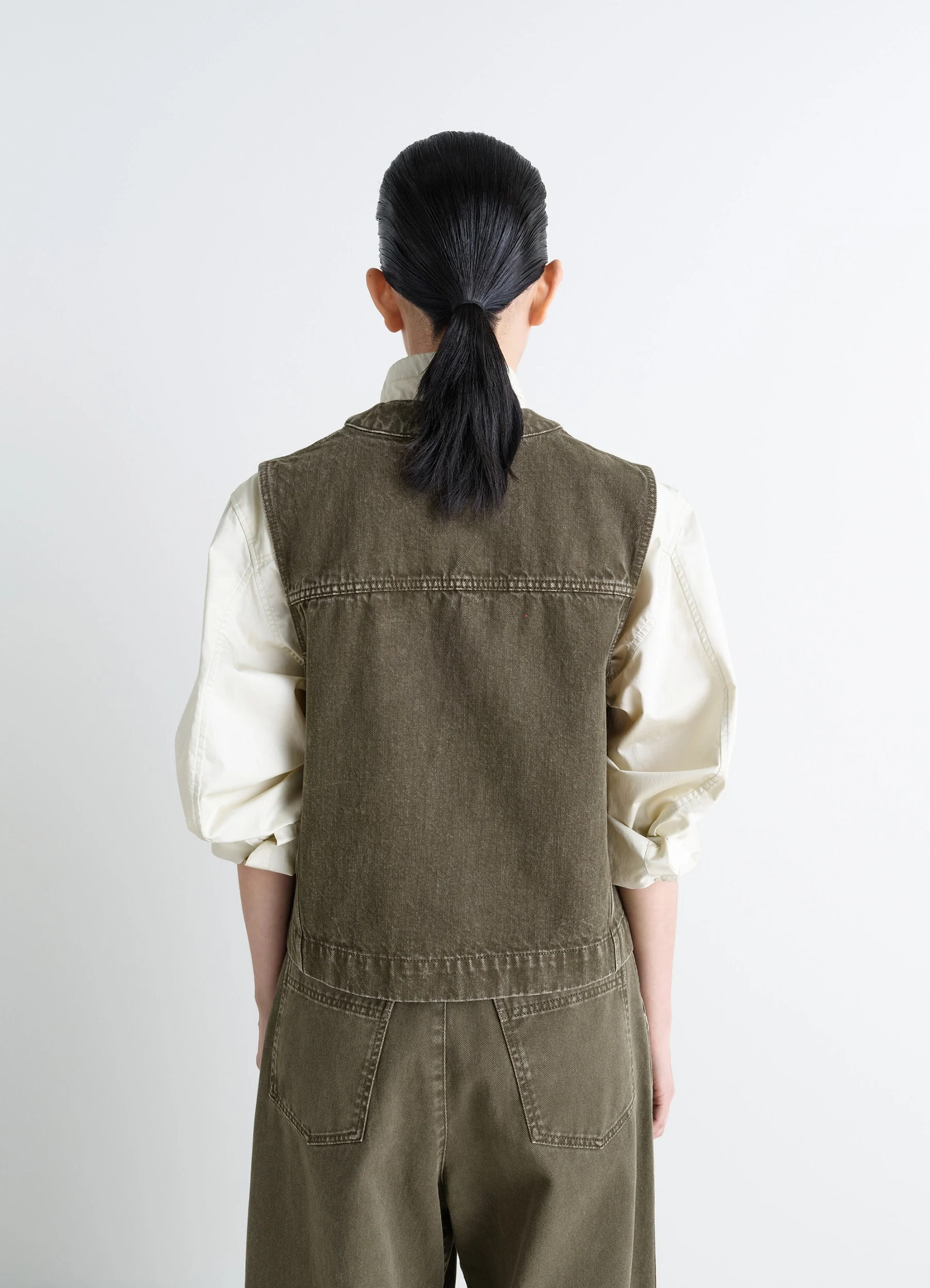 Lemaire pocket gilet in garment dyed snow thick denim, model shot, back view straight cut