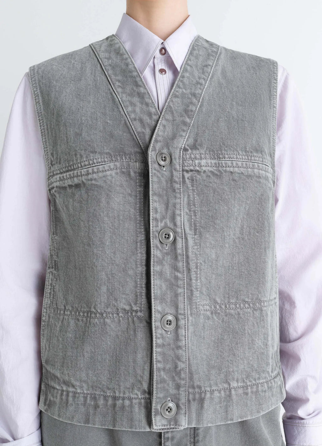 Lemaire Pocket Gilet in Garment Dyed Snow Denim, model shot, close-up front collared shirt pairing