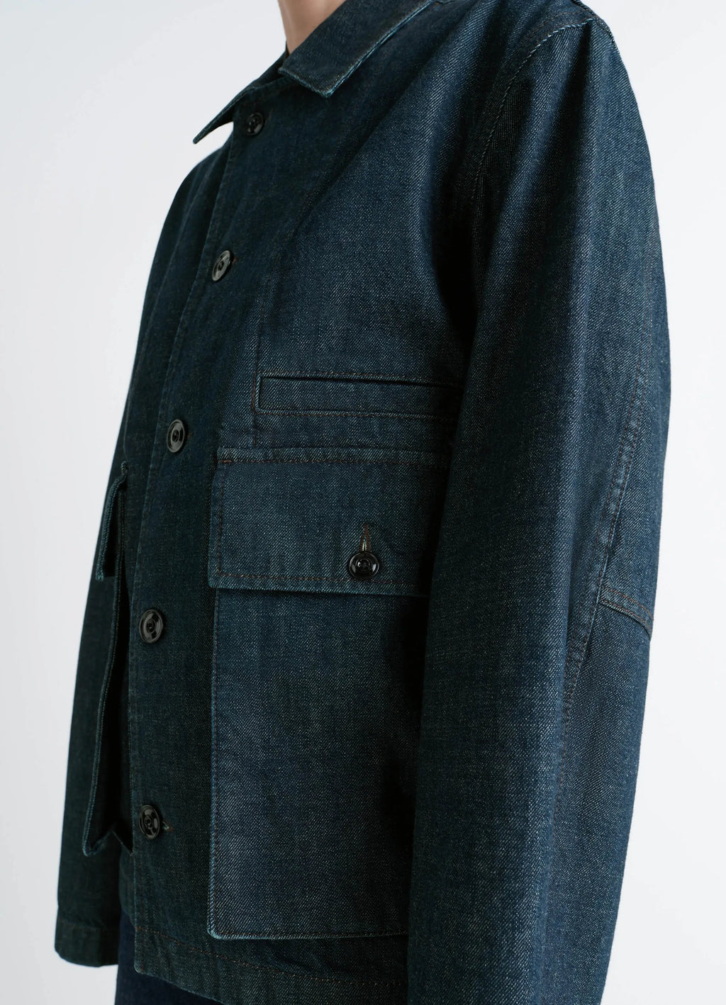 Lemaire Boxy Jacket in Deep Indigo Denim, model shot, close side detail collar with top stitching