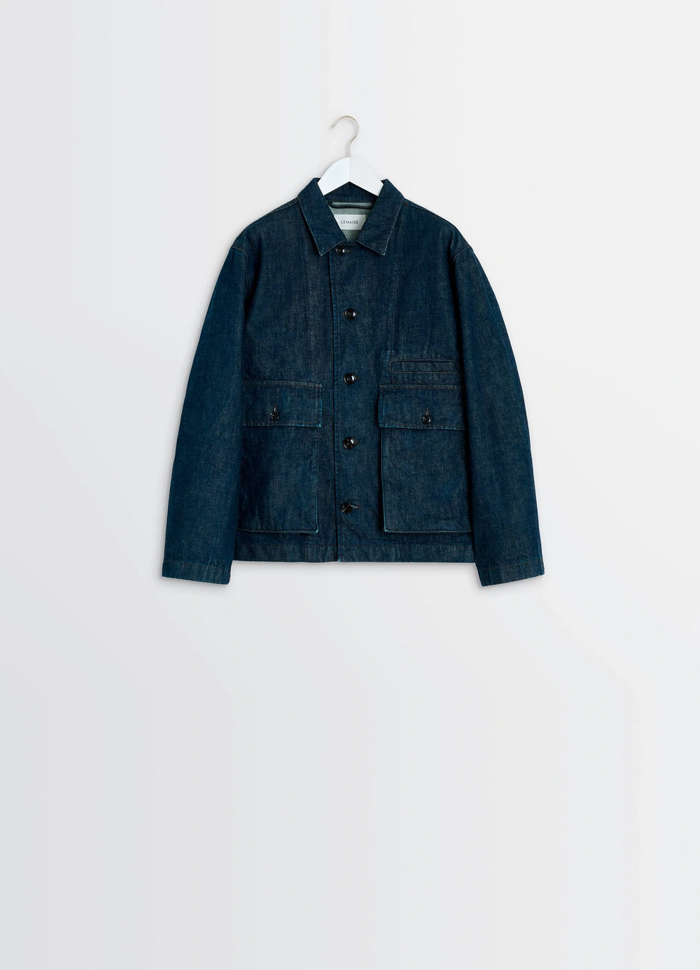 Lemaire Boxy Jacket in Deep Indigo Denim, product shot, hanging display view neat collar stitching