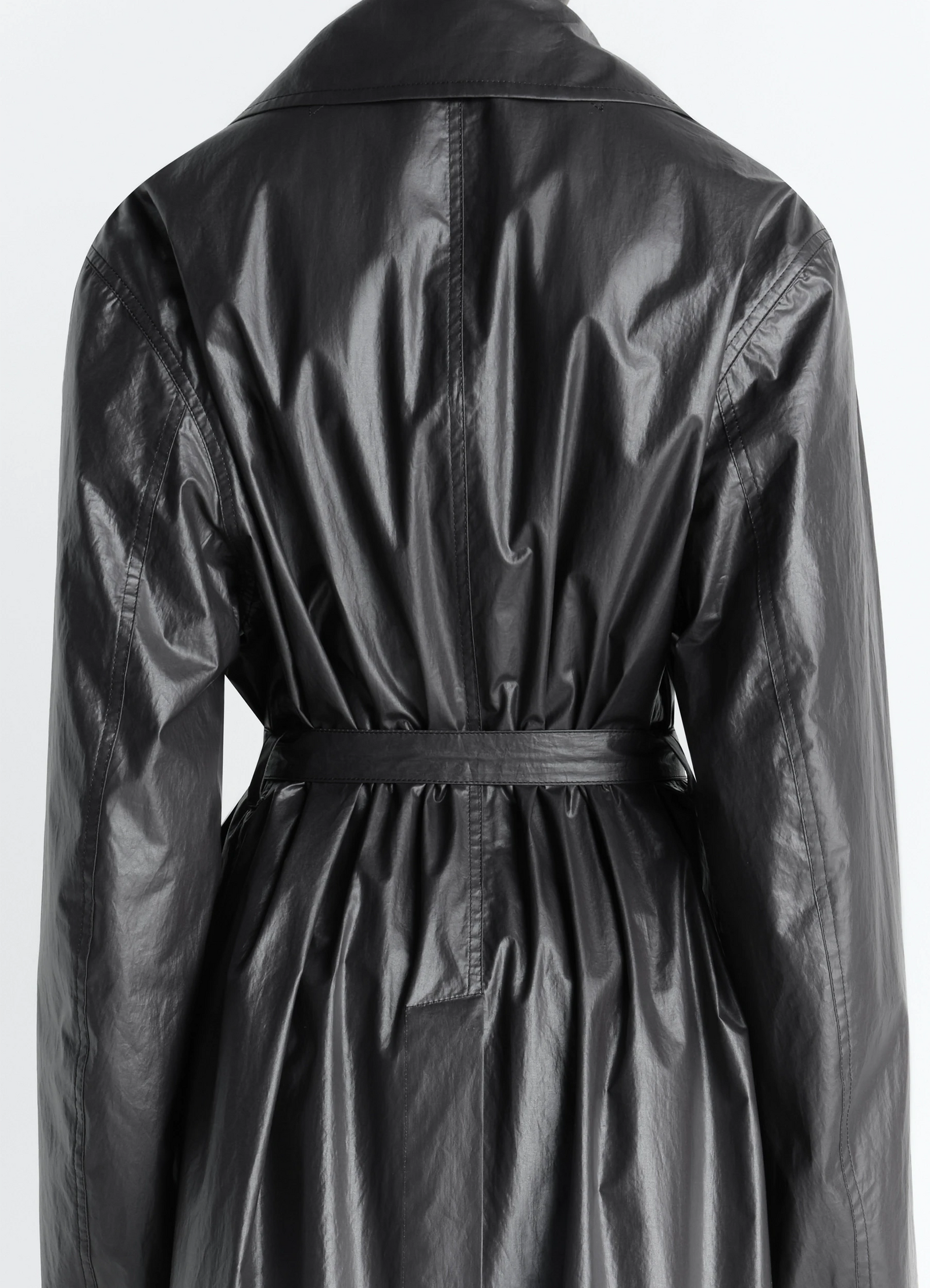 Light wrap coat in light coated cotton, product shot, close-up back detail gathered textured fabric