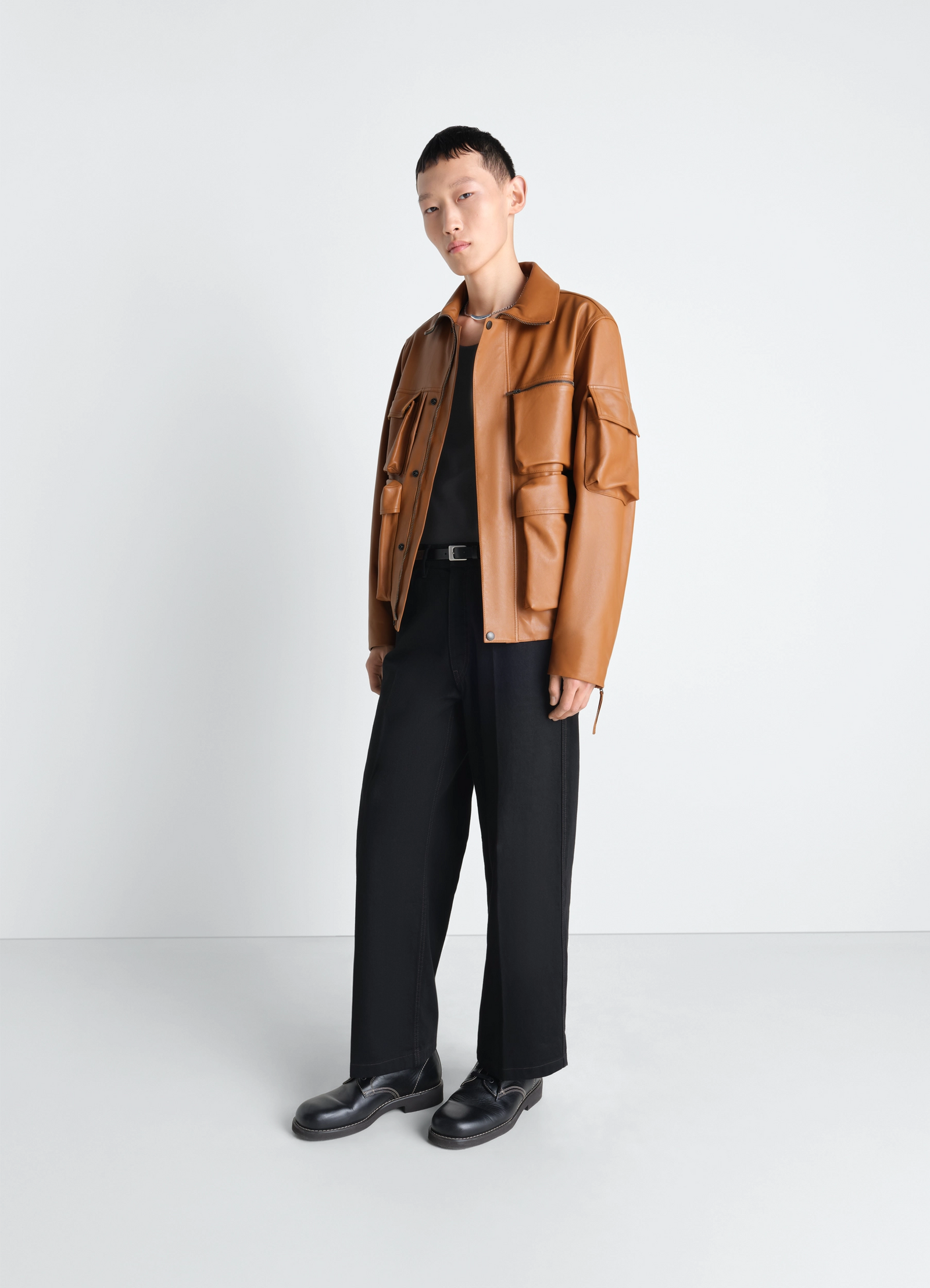 Lemaire leather blouson in cowhide leather, model shot, three-quarter view relaxed fit silhouette
