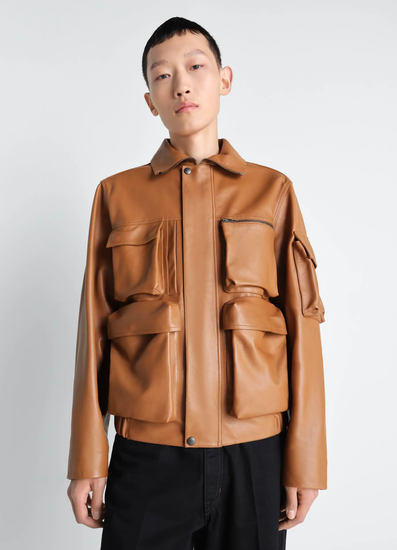 Lemaire leather blouson in cowhide leather, model shot, upper body view structured fit, chest pocket