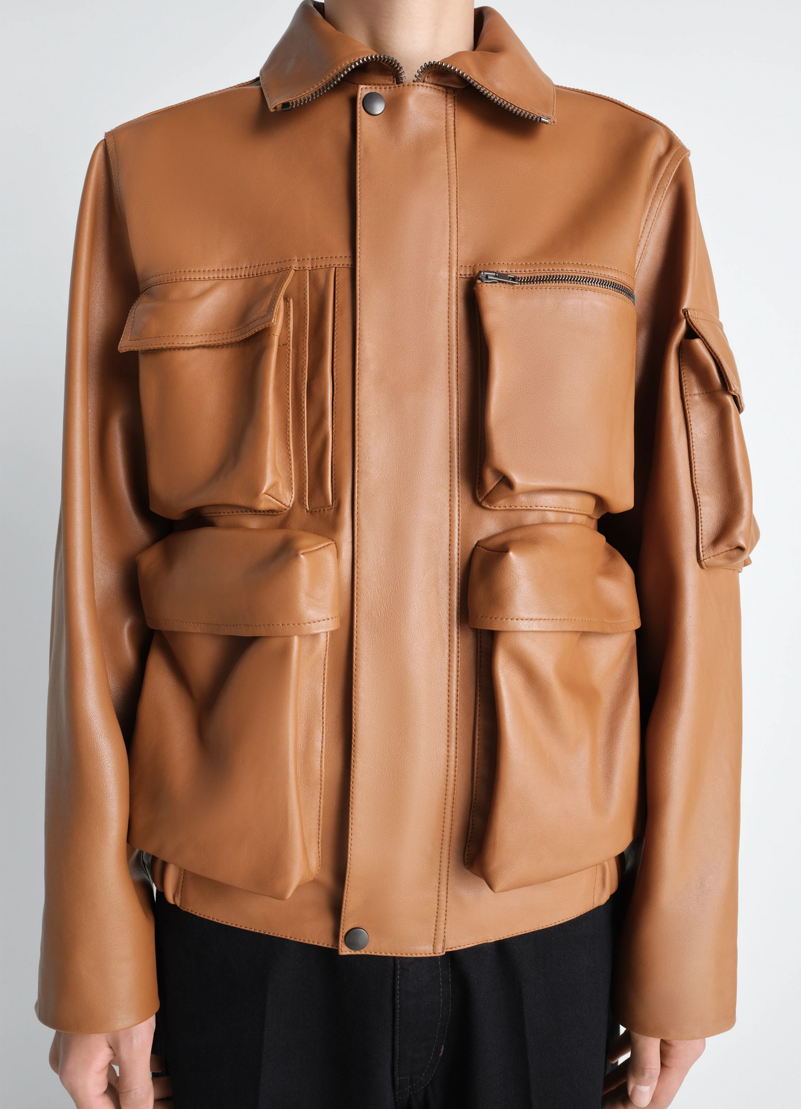 Lemaire leather blouson in cowhide leather, model shot, close-up midsection zip closure, flap pockets