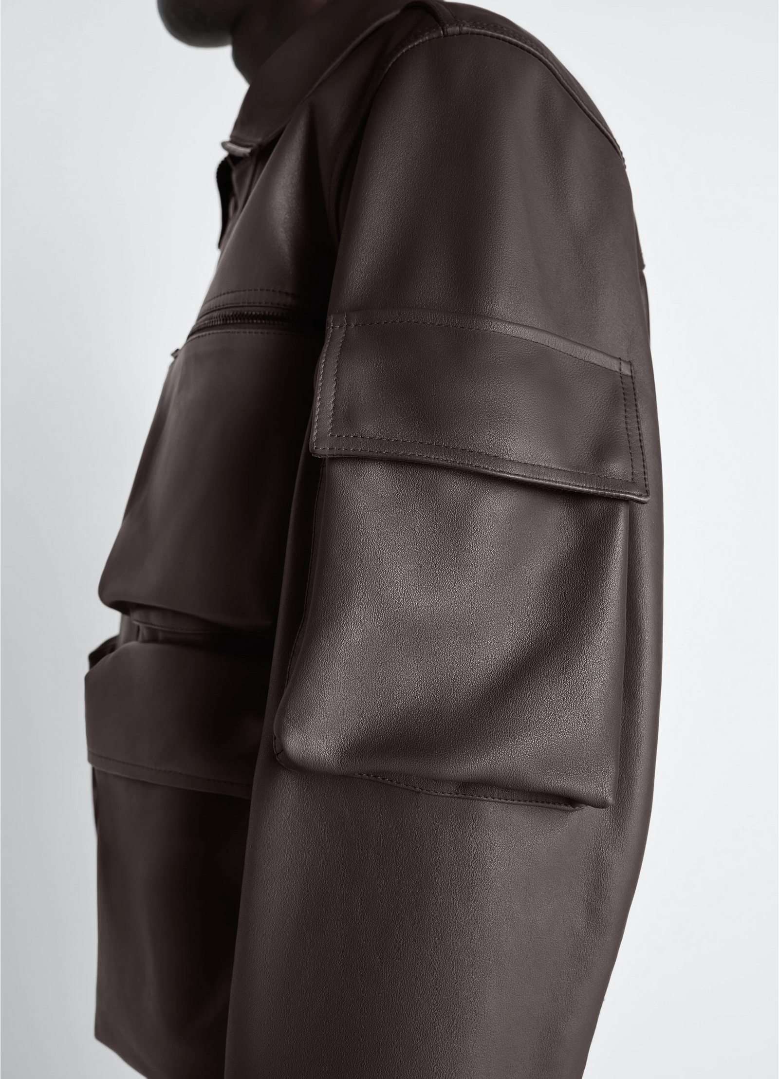 Lemaire leather blouson in cowhide leather, model shot, side detail shot overlay flap pockets