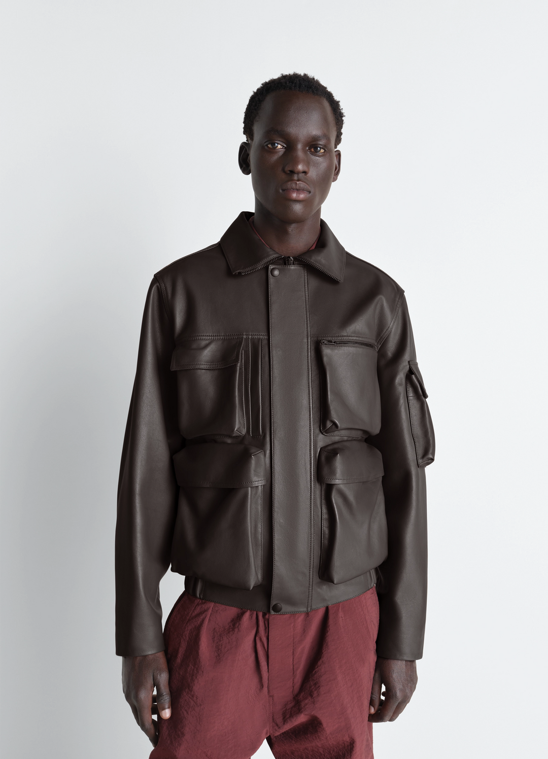 Lemaire Leather Blouson in Cowhide Leather, model shot, Front view Multi-pocket design