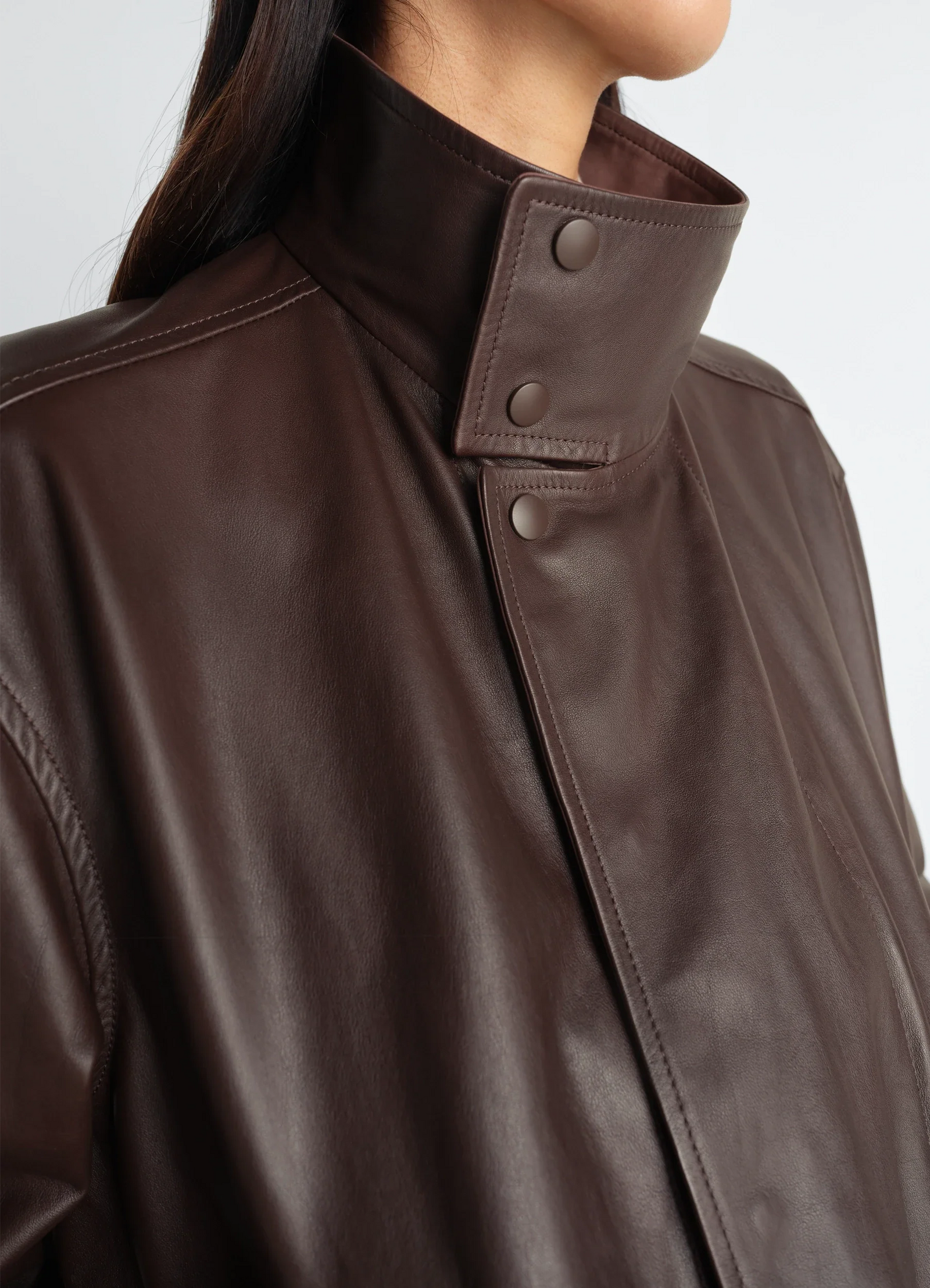 Lemaire soft leather blouson in paper leather, model shot, close-up collar detail snap button high collar