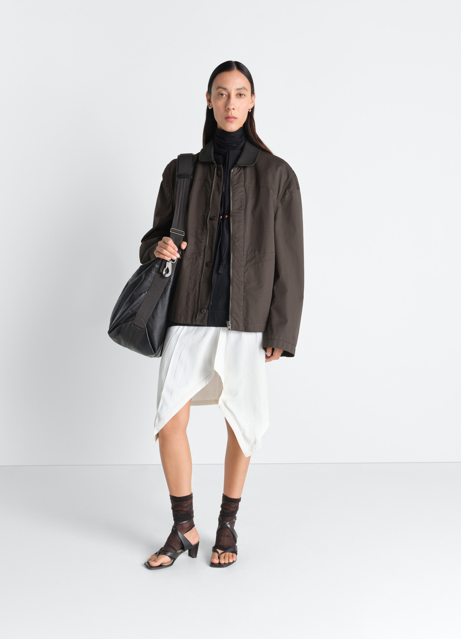 Leather collar blouson in cotton twill, model shot, side view drop shoulder