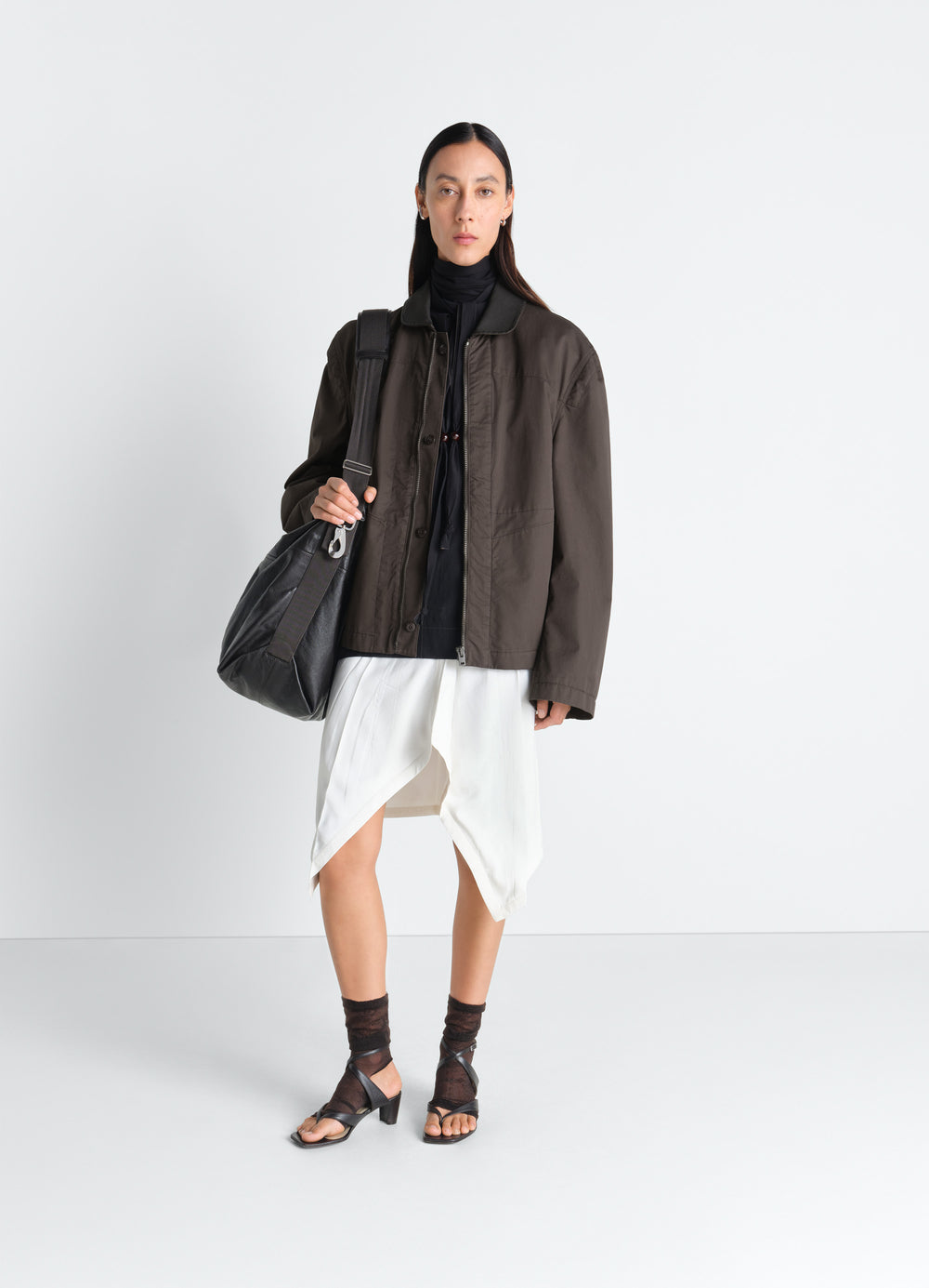 Leather Collar Blouson in Cotton Twill, model shot, side view drop shoulder