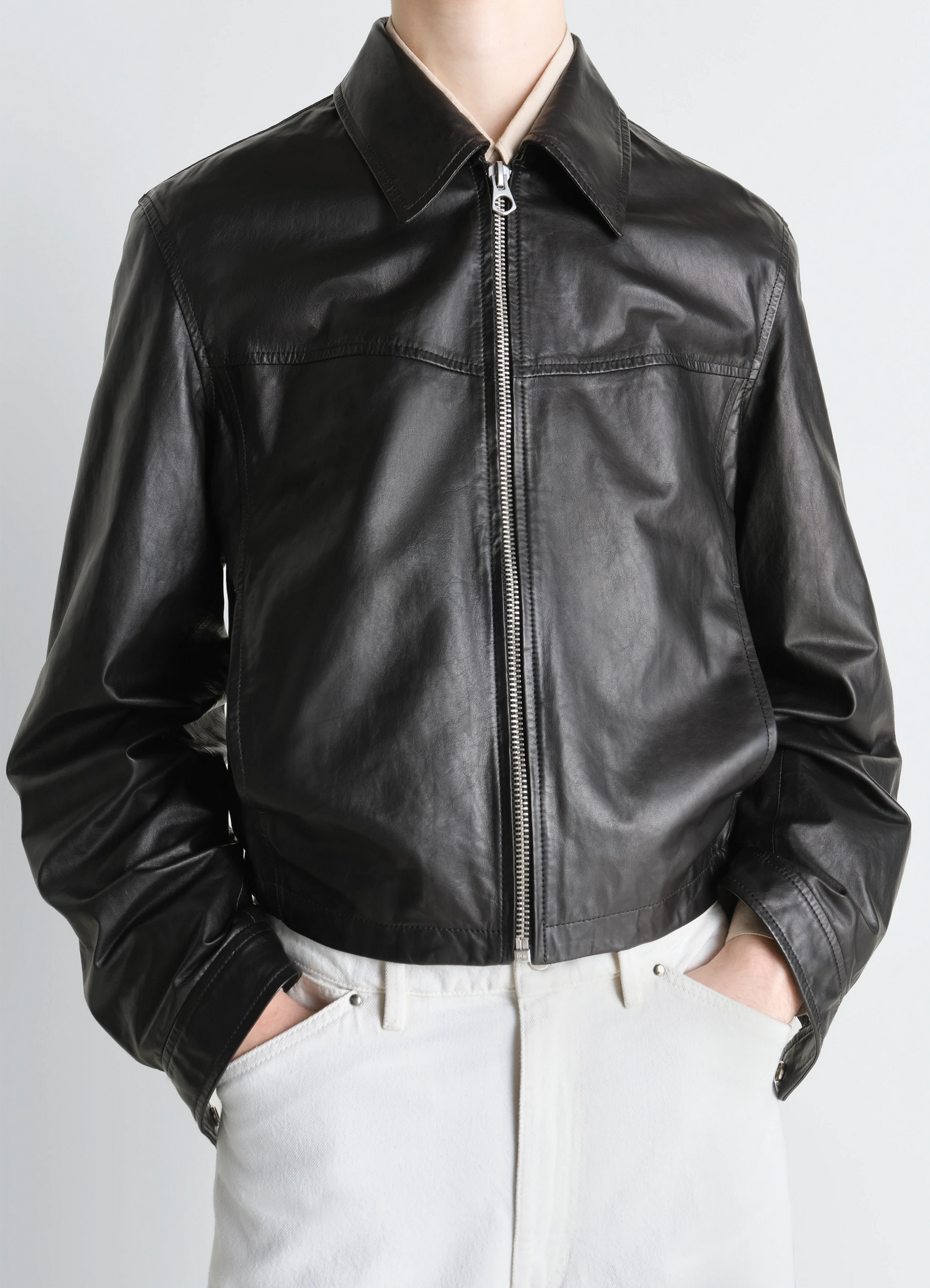 Lemaire biker blouson in paper leather, model shot, close-up front view loose collar design