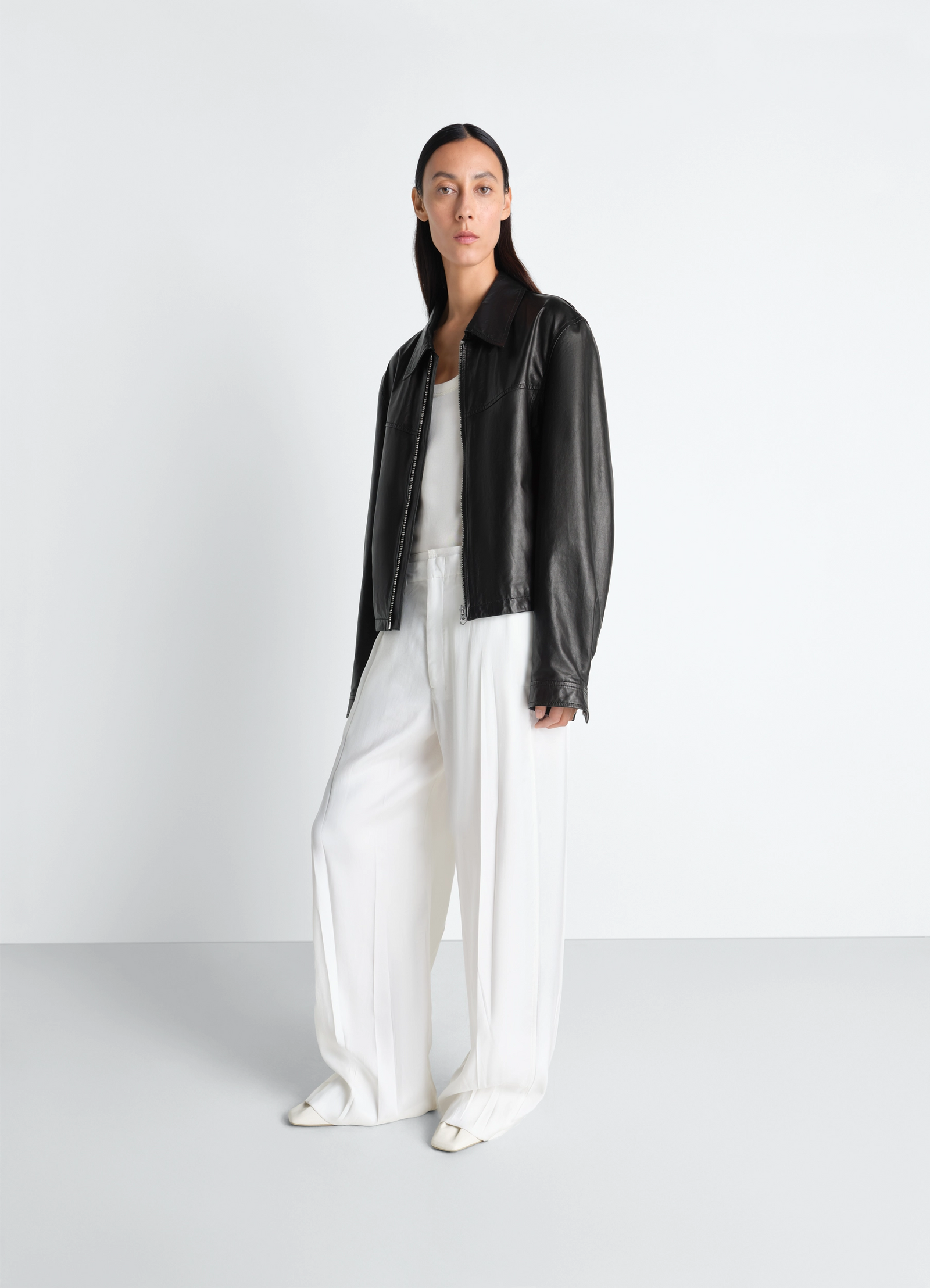 Lemaire biker blouson in paper leather, model shot, three-quarter view relaxed fit
