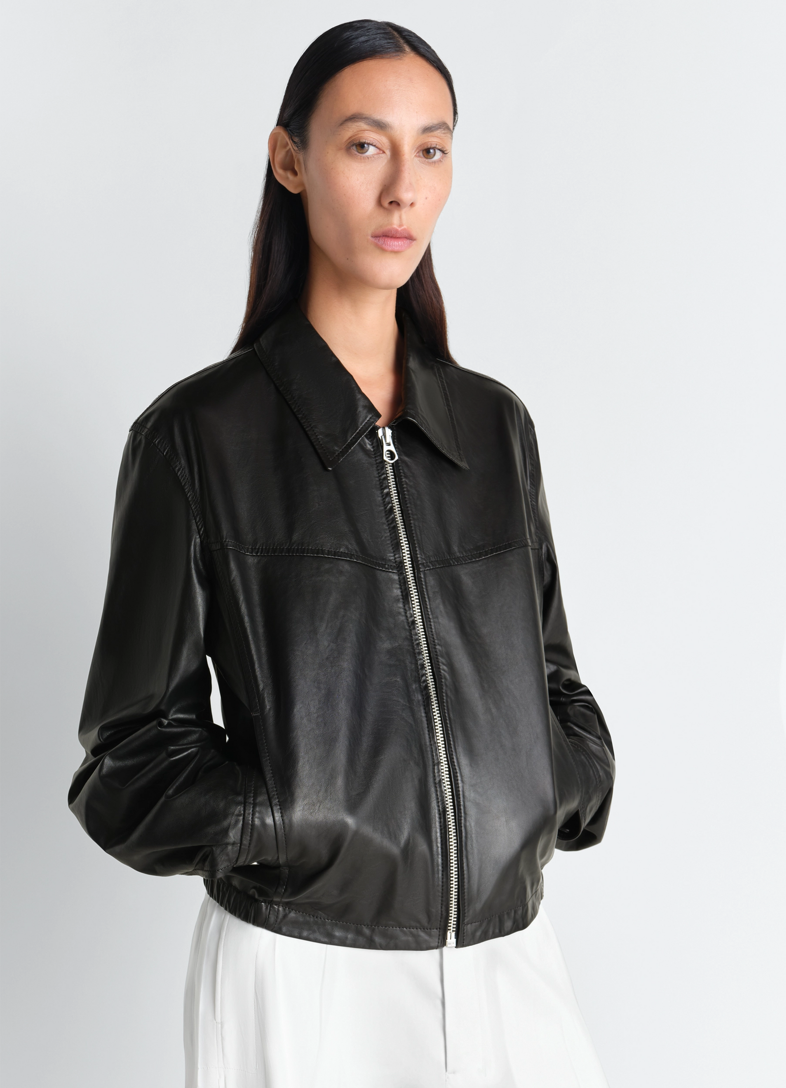 Lemaire biker blouson in paper leather, model shot, close-up three-quarter view structured collar