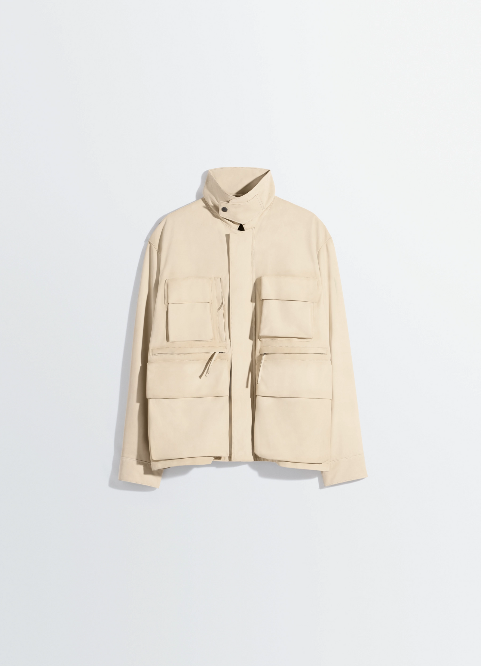Reporter jacket in nubuck, product shot, angled top view dual large flap pockets