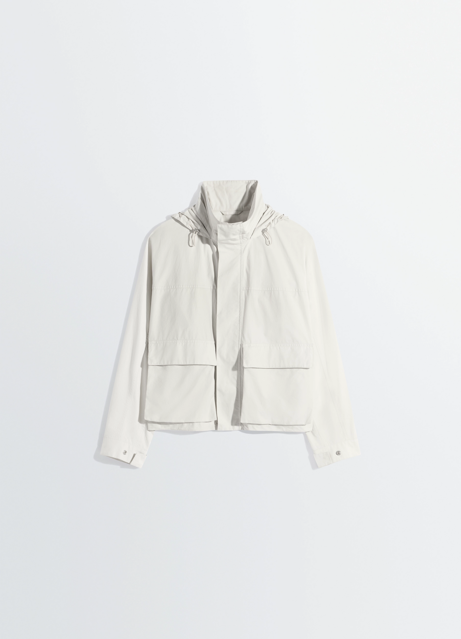 Short rain parka in ventile® cotton, product shot, front elevated view snap button cuff, boxy fit